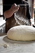 Pizza Dough and Flour with a chef