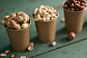 Peanuts, cashews and hazelnuts in cups