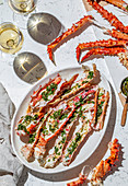 King Crab with herb lemon sauce and white wine.