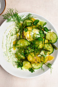 Potato salad with cucumber, dill and quark dressing
