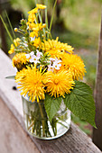 Spring posy of dandelions, buttercups, lady's smock, and cleavers