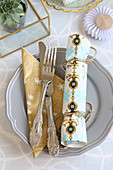 Handmade crackers on place setting
