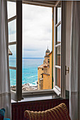 View of sea through window