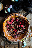 Dutch Baby with Easter Eggs and Raspberries