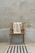 Knitted cloth on bamboo chair
