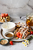Honey sesame waffles with strawberries