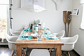 Handmade place mats on wooden table in summery dining room