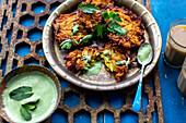 Onion baji (Indian onion fritters) with mint dip