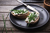 Spelt baguette with almond cream cheese and chives