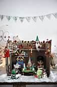 Handmade Christmas workshop diorama made from kitsch knick-knacks