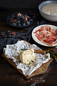 Blue cheese with prosciutto and figs