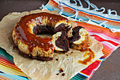 Mexican chocolate flan with biscuit and caramel custard pudding and caramel sauce