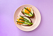 Delicious toast bread sandwiches with asparagus and fried eggs
