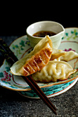Dumplings with soy sauce (Asia)