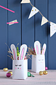 Handmade Easter nests with bunny motif made from recycled tetrapacks