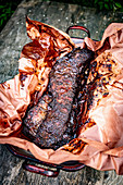 Grilled beef ribs on a piece of paper