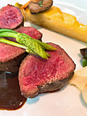 Roasted saddle of venison with wild asparagus