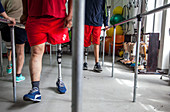 Colombian land mine victims having prosthetic legs fitted