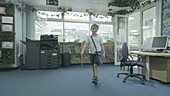 Schoolboy walking into classroom, slo-mo