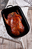 Roasted duck in baking dish