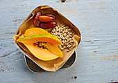 Papaya, dates and sunflower seeds