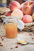 Peach jam with pink pepper