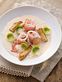 Chestnut soup with Brussels sprouts and ham