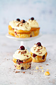Vegan cupcakes with cherries and vanilla pudding cream