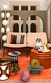 Side tables in front of two-seater sofa against mural wallpaper with architectural motif