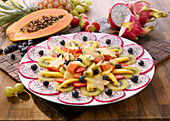 Carpaccio with pitahaya and an exotic fruit salad
