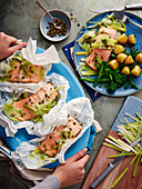 Salmon with leek and herbs in parchment paper