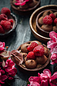 Chocolate tartlets with raspberries
