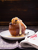 A baked apple with vanilla froth