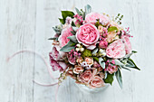 Lavish bouquet of roses, lily-of-the-valley and lamb's ear