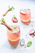 Rhubarb and strawberry lemonade with mint leaves