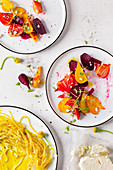 Spaghetti in sage butter with a colorful beetroot salad