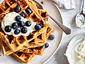 Stacked cheesecake waffles with blueberries