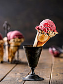 Raspberry sorbet in homemade ice cream cones