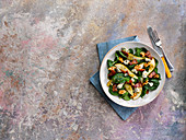 Spinach salad with pears, blue vinney, bacon and walnuts