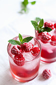 Raspberry mocktail with mint and ice cubes