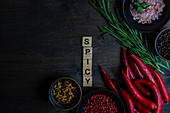 Cooking concept with spice ingredients on wooden table with copy space