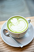 Cup of matcha green tea latte