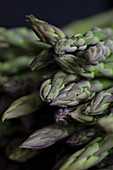 Green asparagus dark background