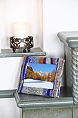 Winter scene in picture frame with knitted cover in jacquard pattern
