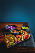 Smoky pulled pork belly tacos with grapefruit salsa