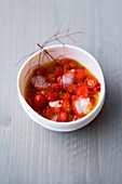 Carabinero ceviche with date tomatoes and cloves
