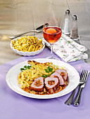 Stuffed pork fillet with spaetzle and roasted cabbage