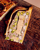 Pate en croute with goose liver and pistachios