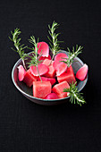 Watermelon with rose petals and rosemary vinegar
