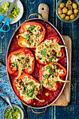 Peppers stuffed with couscous, spinach and droed tomatoes